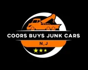COORS BUYS JUNK CARS